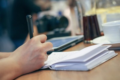 hand writing in journal